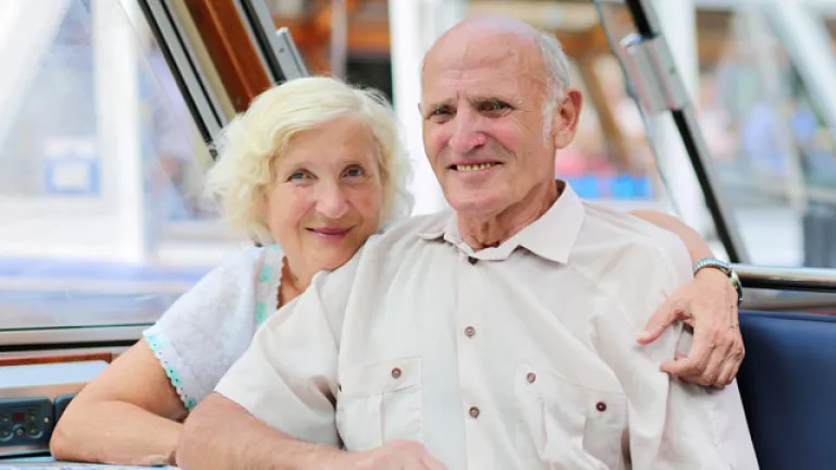 Retiree enjoying a scenic ferry ride in Amsterdam